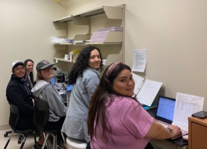Daniel, Jenny, Evelyn, Kaylee, and Sarai doing data entry (March 2023)